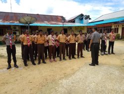 Binmas Polres Supiori Gelar Longmars Saka Bhayangkara