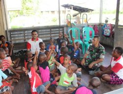 Satgas Yonif 121/MK Berbagi Kasih Dengan Anak Panti Asuhan