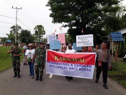 Koramil 1701-07/Mapurujay Meriahkan Karnaval Hardiknas dan Gerakan Milenial Anti Miras