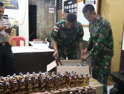 Satgas Yonif MR 411/PDW Sita Ribuan Botol Miras di Jalan Trans Papua