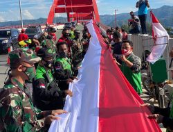 Merah Putih Terbentang Megah di Sepanjang Teluk Youtefa dan Mappi